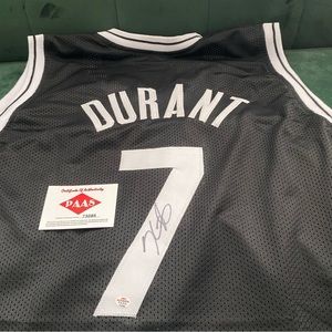 Autographed Kevin Durant jersey with Certificate of Authenticity.